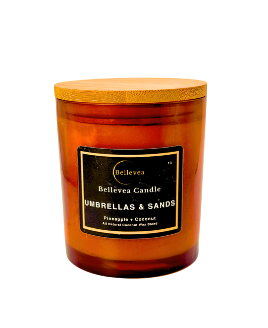 11 oz Bellevea Umbrella and Sands, the scents of pineapple and coconut.