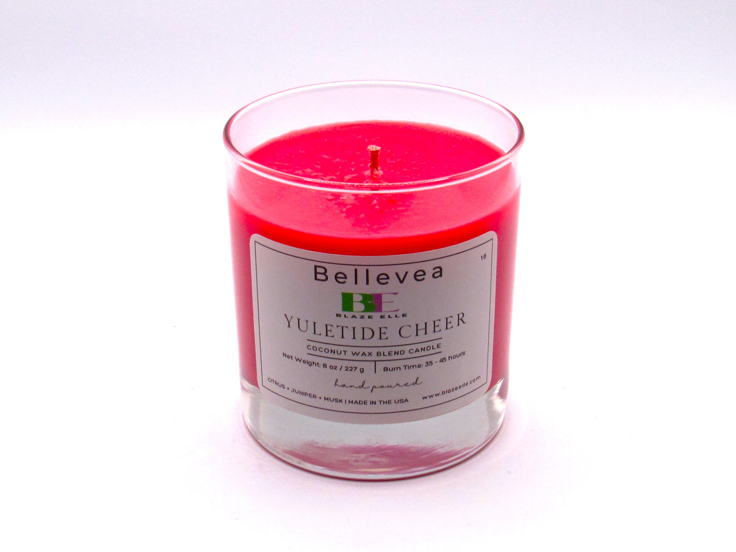 8oz Bellevea Yuletide Cheer Candle, the scents of citrus, cinnamon, amber, clove, nutmeg, vanilla, juniper and musk