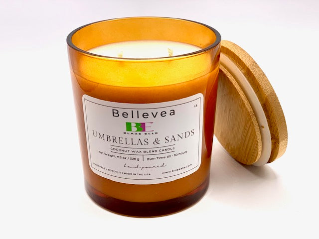 11.5oz Bellevea Umbrella and Sands, the scents of pineapple and coconut.